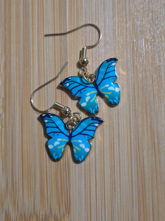 Teal and white butterfly earrings