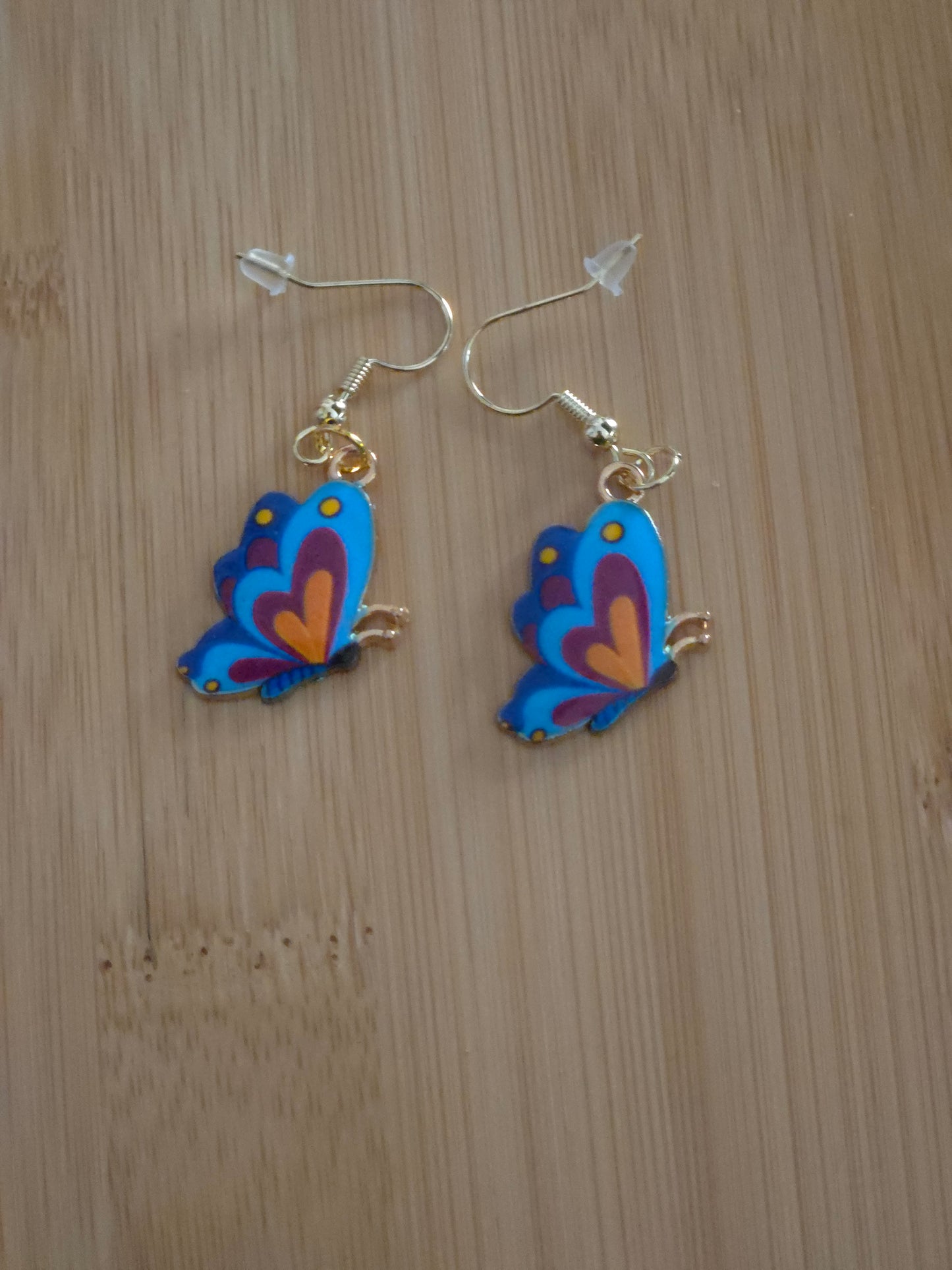 Blue and orange dangle butterfly earrings
