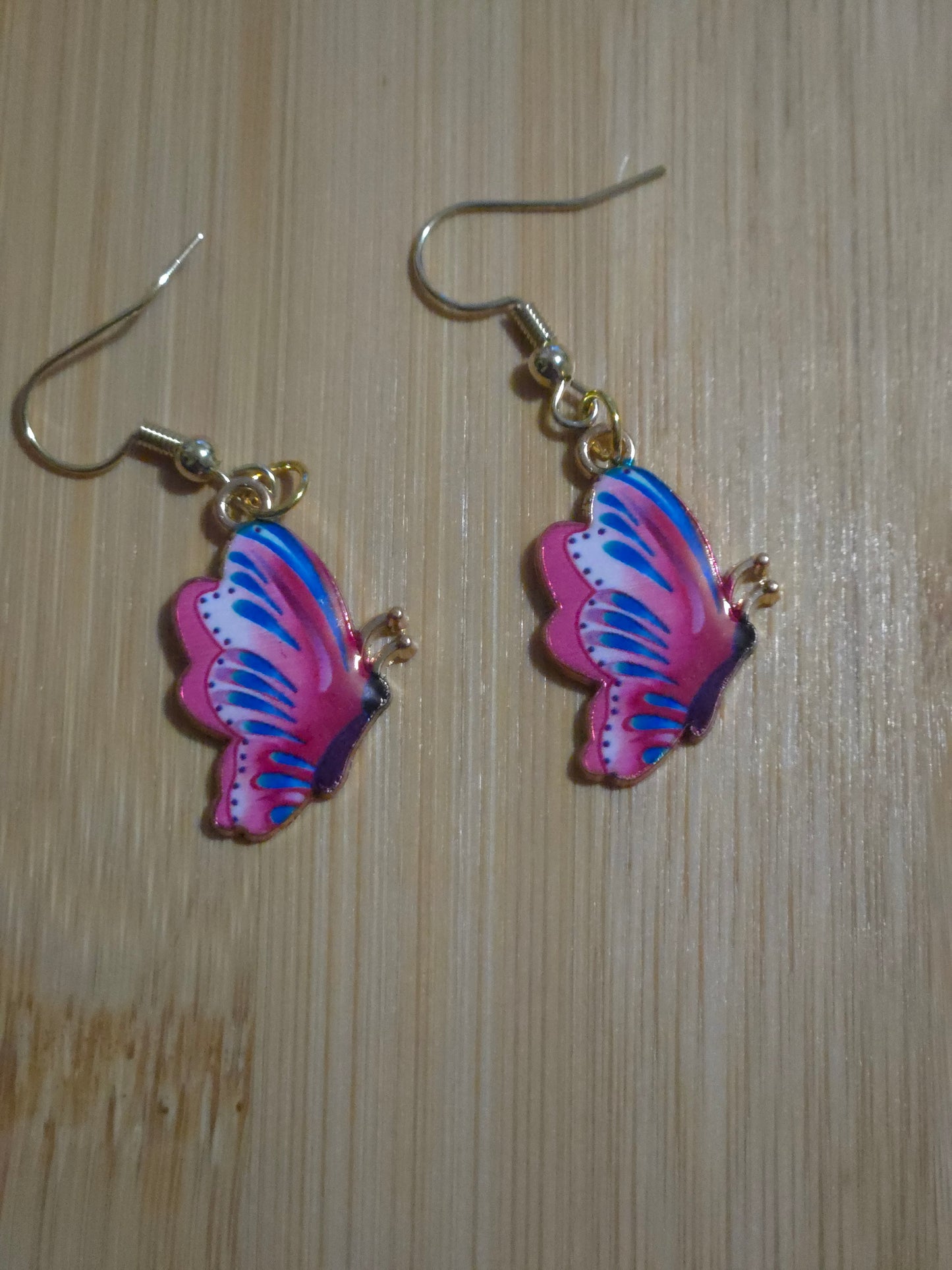 Deep pink and blue dangle butterfly earrings