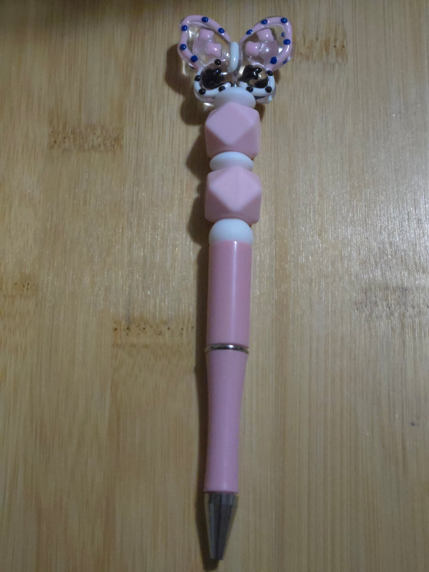 Beaded Pen with hex beads and a Butterfly bead