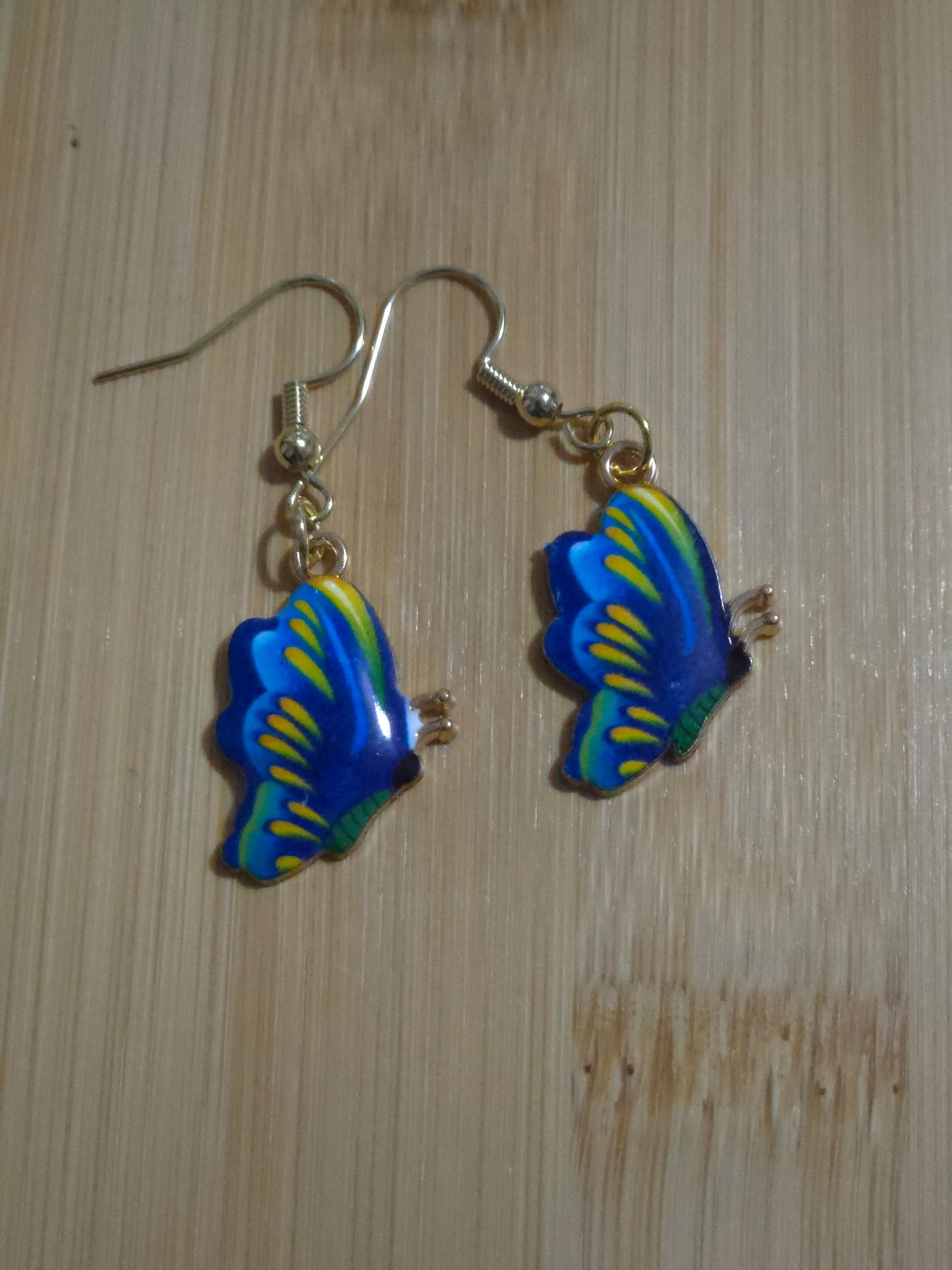 Blue and yellow dangle butterfly earrings
