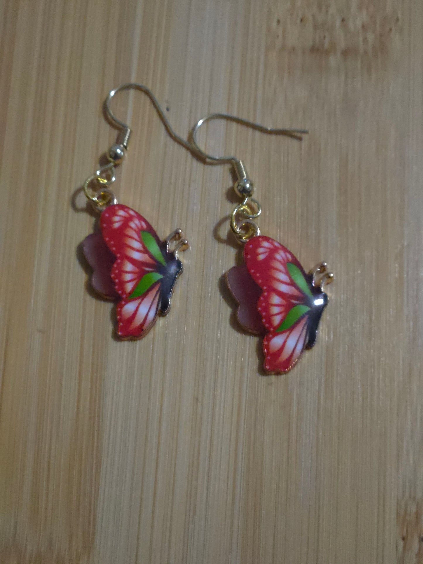 Red and green dangle butterfly earrings