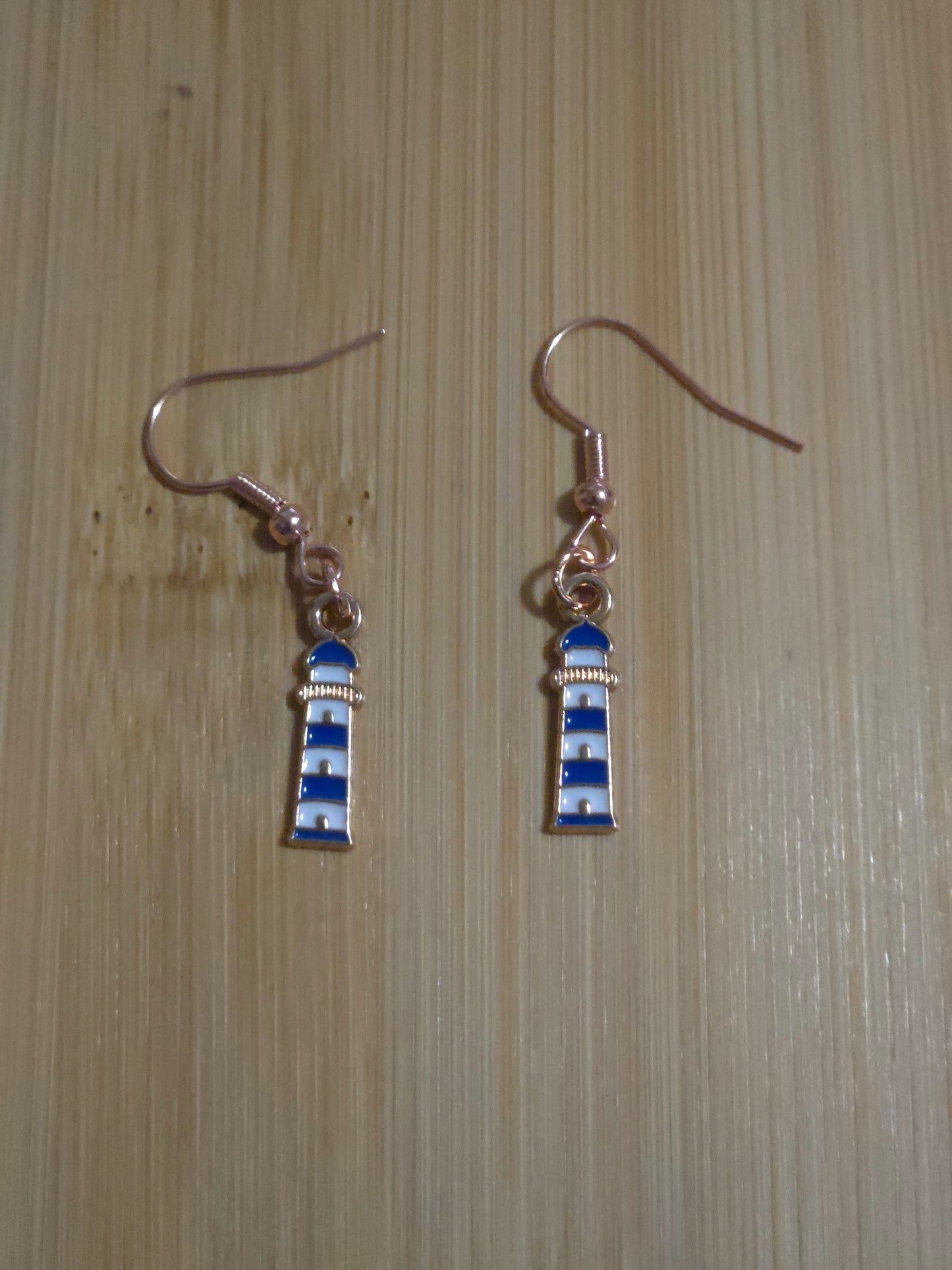 Blue and white dangle lighthouse earrings