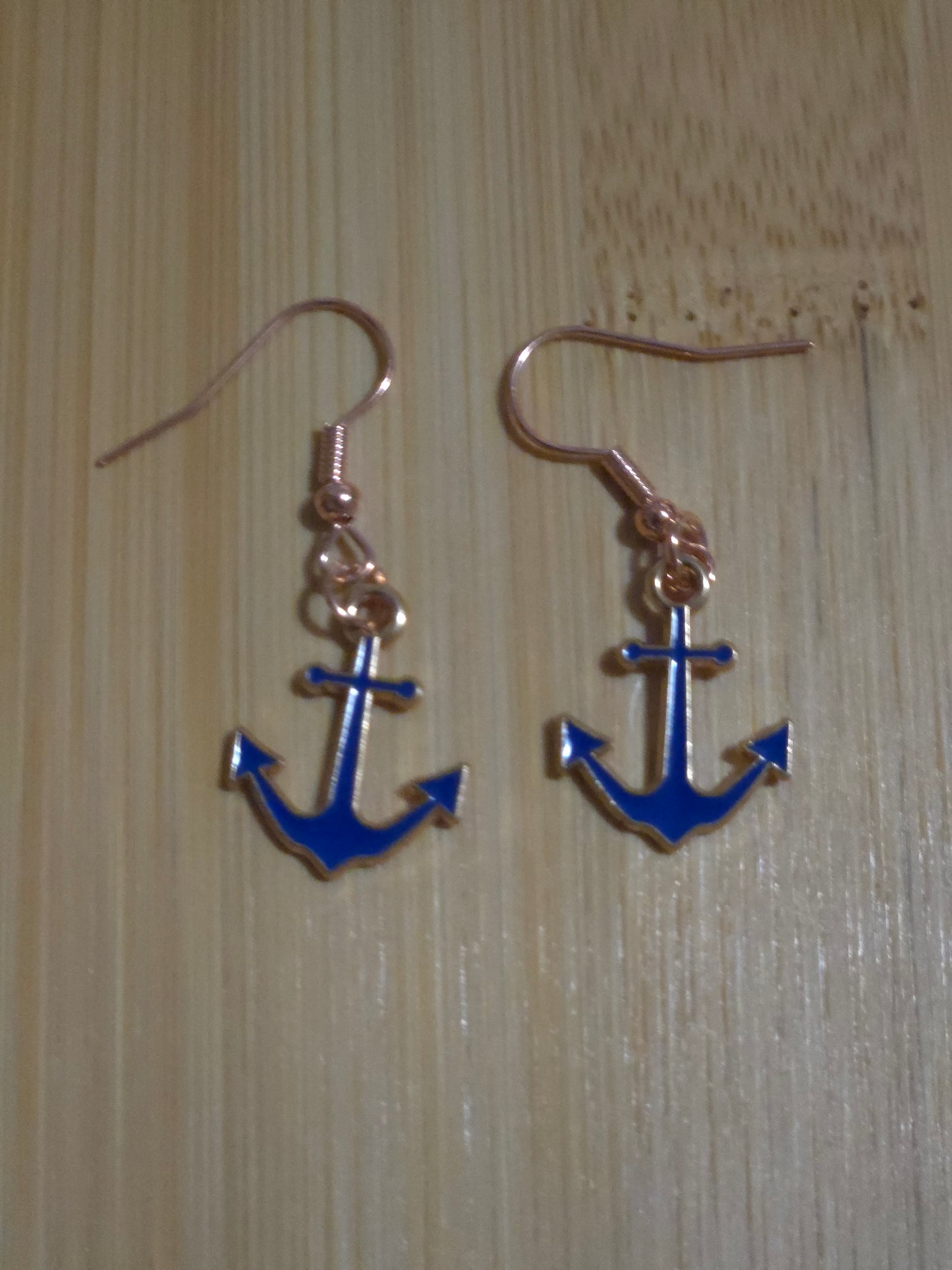 Blue dangle anchor earrings