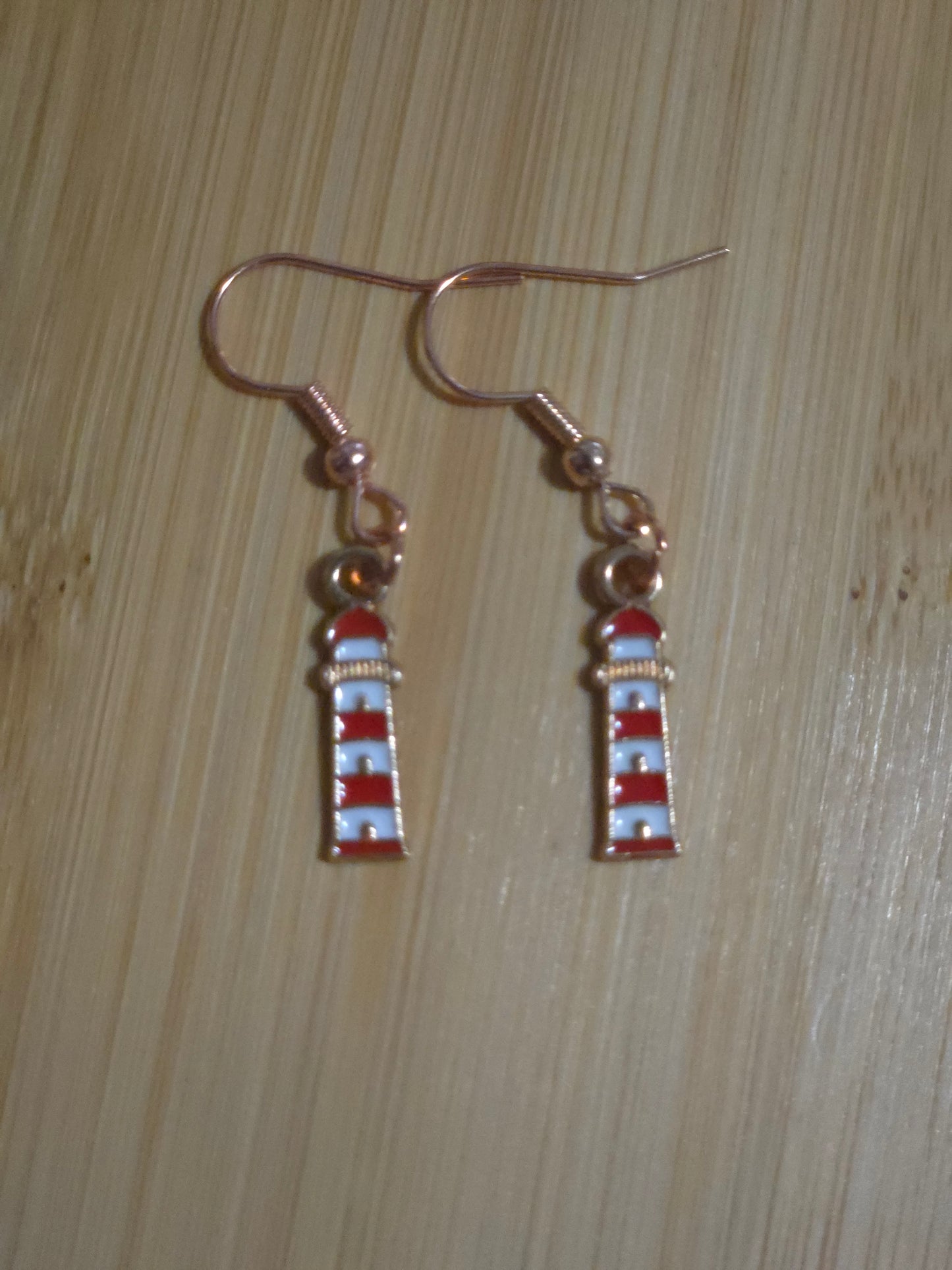Red and white dangle lighthouse earrings