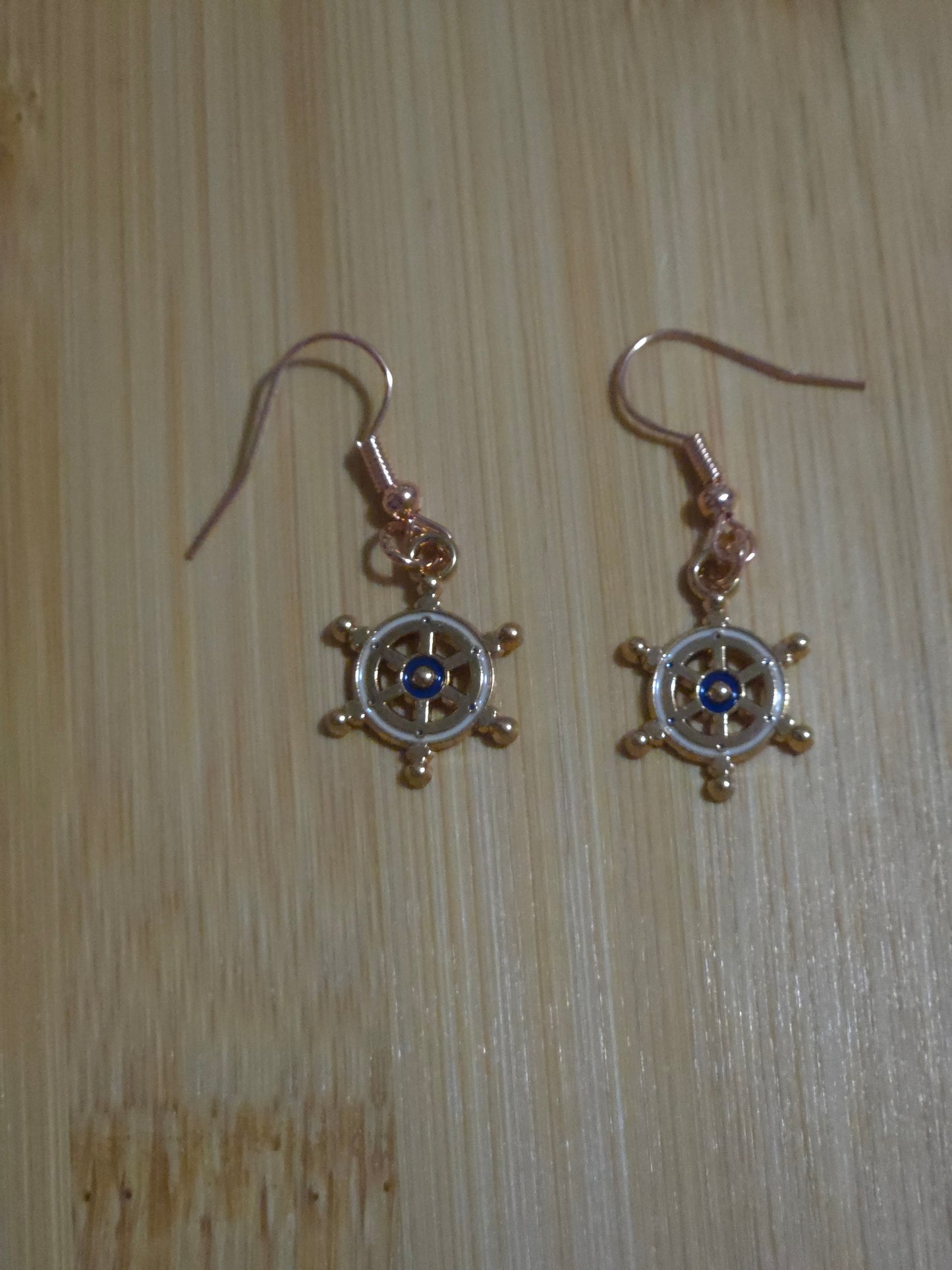 Blue ship's wheel dangle earrings